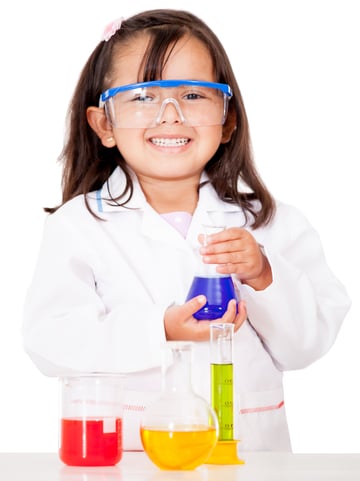 Girl doing chemical experiments at the lab