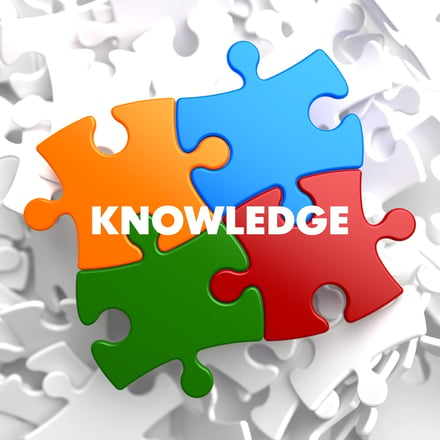 Knowledge on Multicolor Puzzle on White Background..jpeg