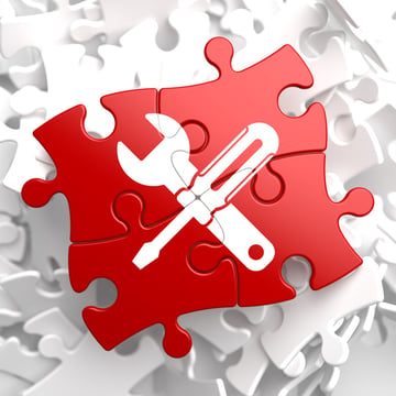Free tool Concept - Icon of Crossed Screwdriver and Wrench on Puzzle Piece.